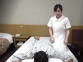 Japanese chick enjoys while giving a nice handjob on the bed